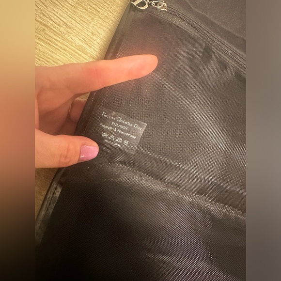 DIOR CLUTCH, MULTI-COMPARTMENT BAG WITH SIGNATURE “D” hanging from zipper pull - Picture 12 of 13